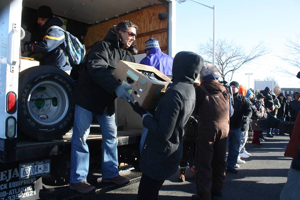 Unloading trucks of donations at the Community Solidarity Hempstead Food Share