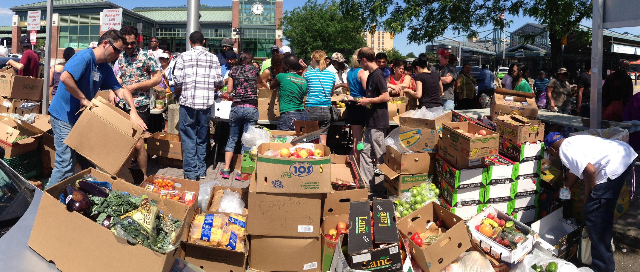 Volunteers setting up the produce section at the Community Solidarity Hempstead Food Share